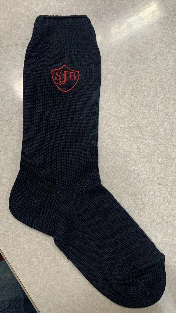 Media colegial azul oscuro con escudo bordado